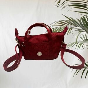 Kipling Red Mini Bag with Structured Design